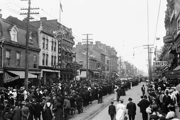 People line the streets of Toronto in the early 1900s for a Labour Day parade.