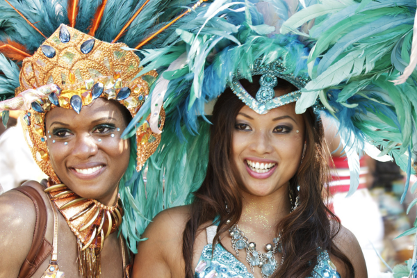 Caribana is an exciting summer festival in 2024 that takes place in Canada. A highlight is the stunning Caribbean costumes such as the ones these women wear. 