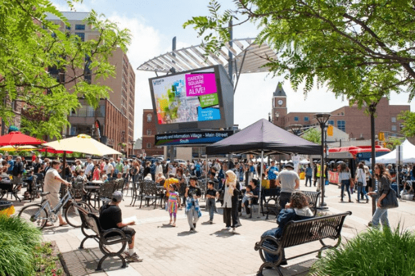 A community event with many people in Garden Square in Brampton, Ontario