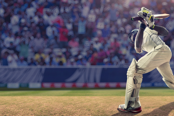 Male cricket batsman hitting the ball during a cricket match. Canada debuts in the ICC T20 Cricket World Cup 2024.